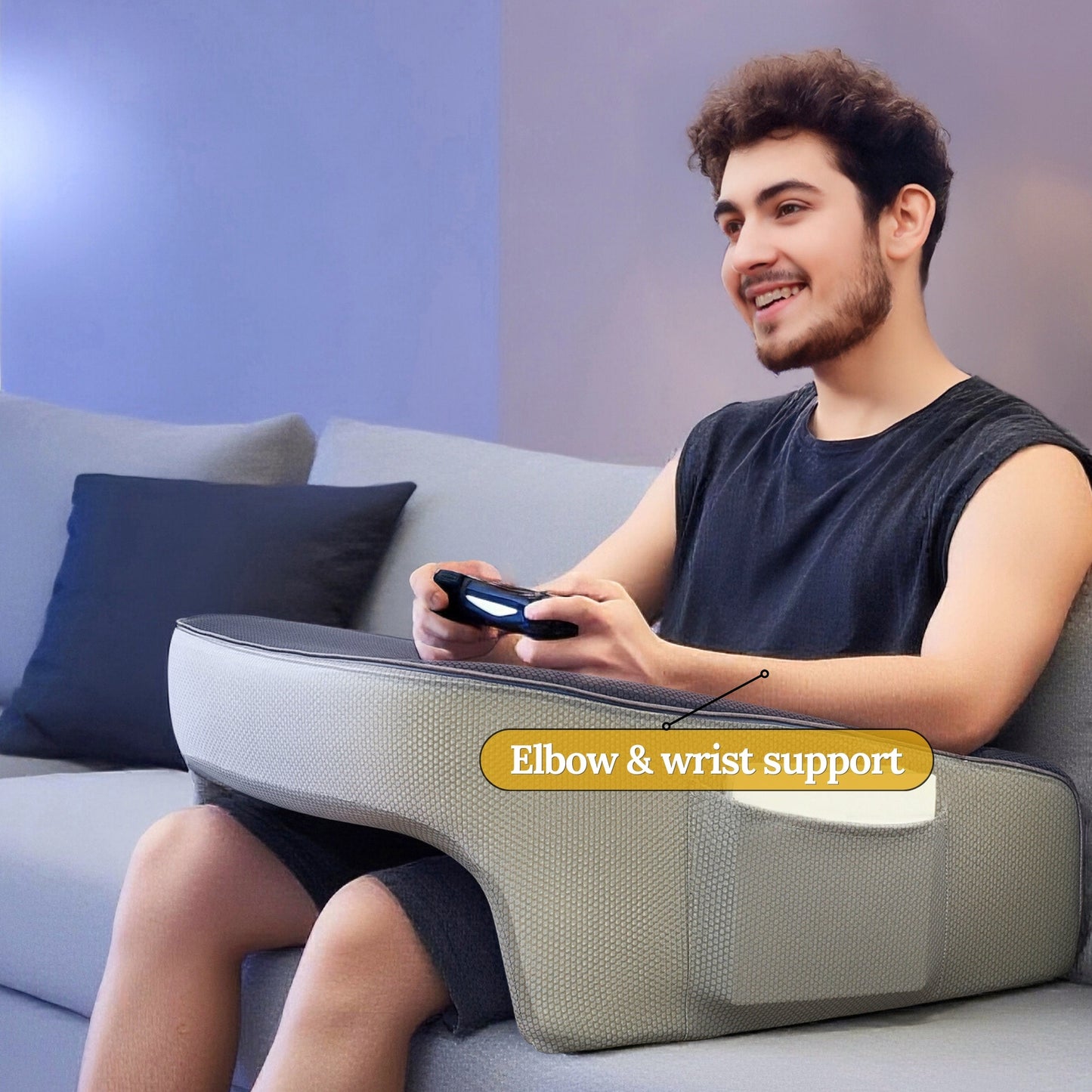 Gamer using a lap desk pillow with elbow and wrist support whilst gaming